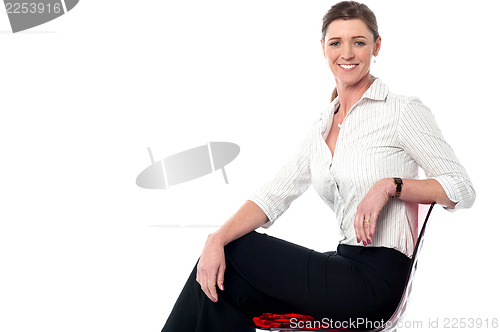 Image of Relaxed smiling corporate lady