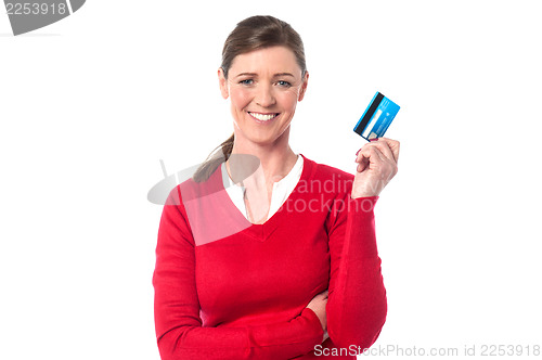 Image of Pretty lady showing her cash card