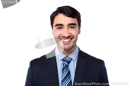 Image of Smiling young successful businessman