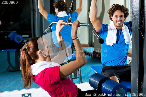 Image of Man and woman in a fitness club
