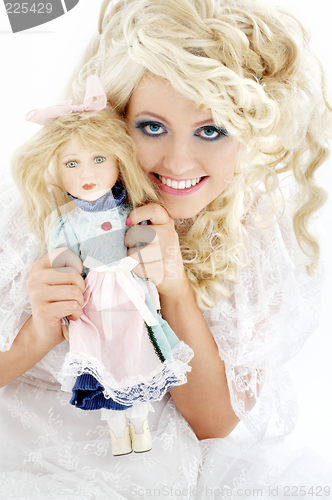 Image of happy bride with doll