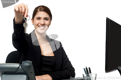 Image of Female secretary offering you cabin key