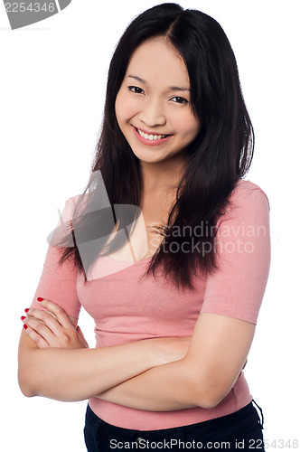 Image of Pretty asian girl posing casually, arms folded