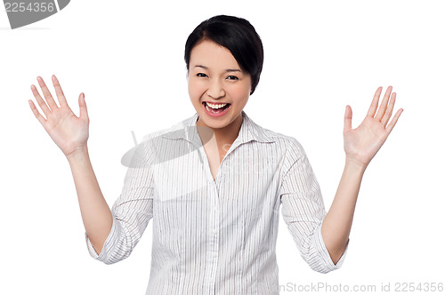 Image of Cute girl laughing heartily with open hands