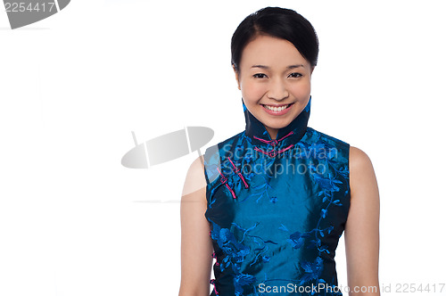 Image of Young attractive chinese woman in blue dress