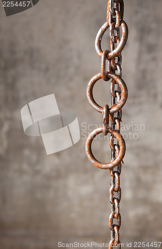 Image of Old weathered industrial chain with rings