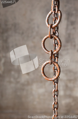 Image of Old weathered industrial chain with rings