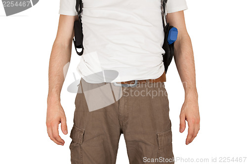 Image of Close-up of a man with holster and a gun