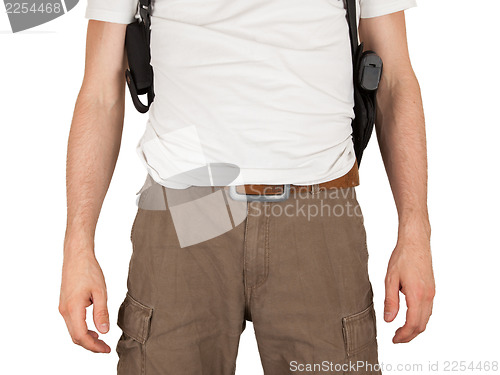 Image of Close-up of a man with holster and a gun