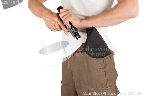 Image of Close-up of a man with holster and a gun