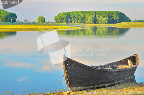 Image of  boats wait on the shore of a Danube