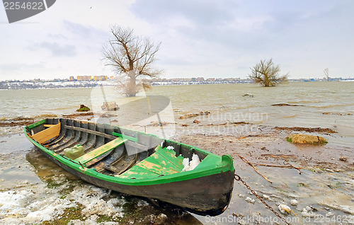 Image of green boat on danube river