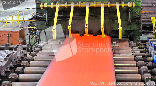 Image of hot steel on conveyor