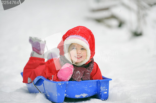 Image of girl on sleigh