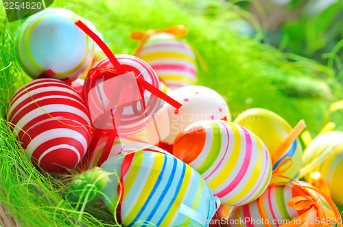 Image of Colorful painted easter eggs in basket 