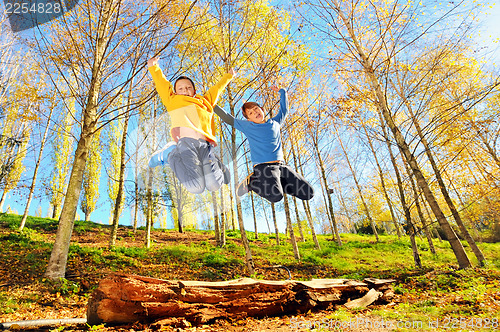 Image of two boys jumping