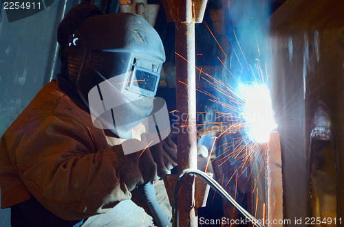 Image of a welder working at shipyard