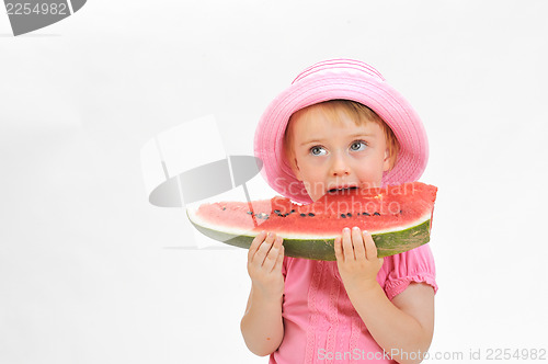 Image of child  eating watermelon