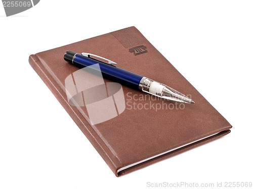 Image of Notebook with blue pen