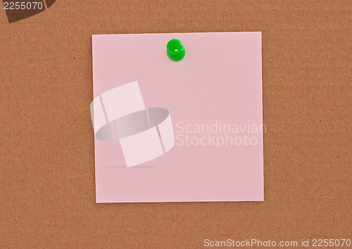 Image of Pink note paper attached with green pin