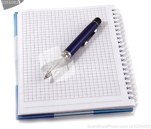 Image of Notebook with blue pen, isolated