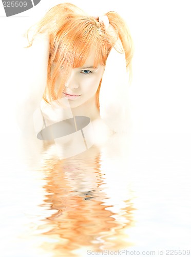 Image of lovely redhead in water