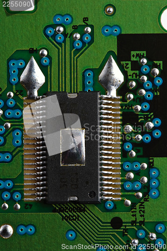 Image of Microchip on green printed circuit board