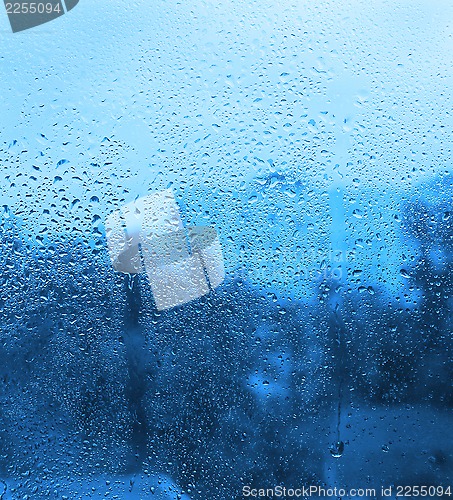 Image of Natural drops of water on window glass