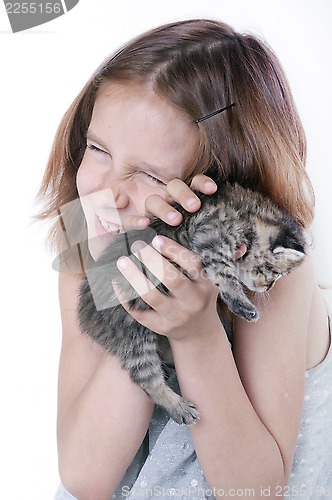 Image of child and kitten