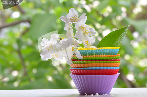 Image of types of muffins with white jasmine flower