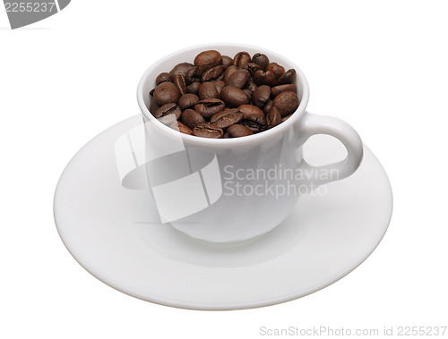 Image of White cup with coffee grains