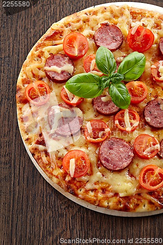 Image of Salami and tomato pizza