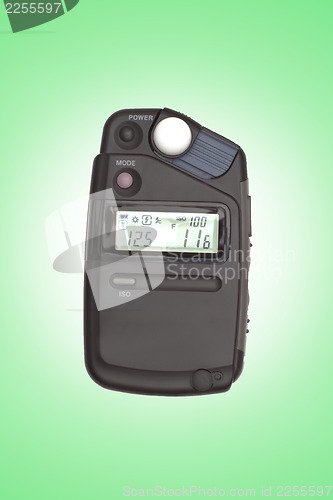 Image of Digital flashmeter, isolated on green backrgound