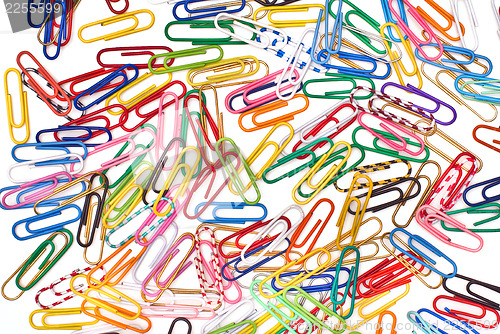 Image of Different paper clips as background