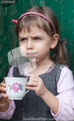 Image of Child drinking milk