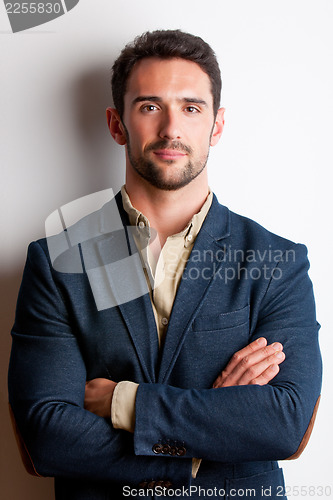 Image of Portrait of a Man With his arms crossed