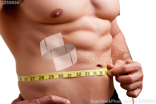 Image of Fit Man Measuring His Waist