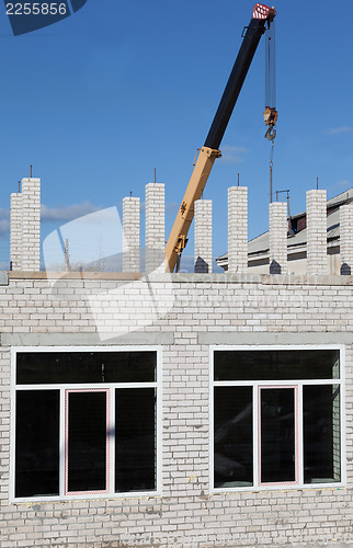 Image of Building a house of gray bricks