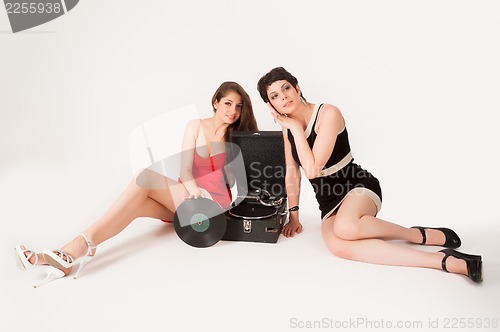 Image of Pretty women with gramophone