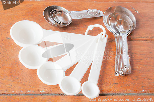 Image of Many types of bakery  measuring spoons on wood table