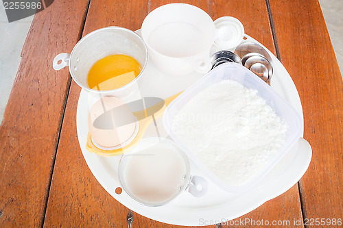 Image of Set of baking ingredients with measure spoon 