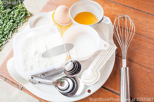 Image of Set of baking ingredients with measure spoon 