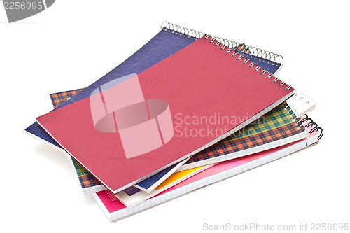 Image of Several notebooks, isolated on white background