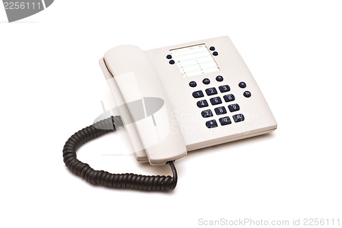 Image of Grey plastic telephone on white background