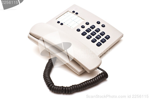 Image of Grey plastic telephone on white background