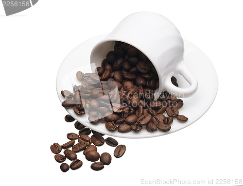 Image of White cup with coffee grains