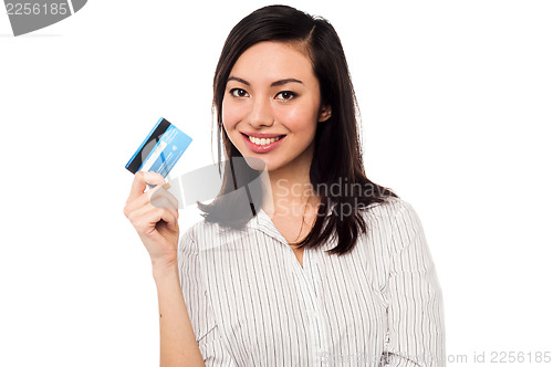 Image of Attractive model displaying credit card