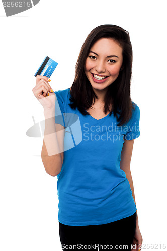 Image of Smiling asian girl showing cash card