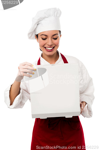 Image of Confident female chef portrait