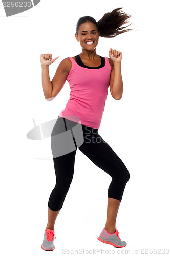 Image of Cheerful fitness trainer filled with enthusiasm
